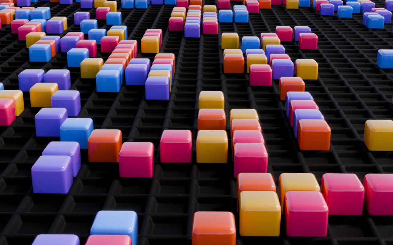 Blender render of a Game of Life simulation: glossy coloured cubes as live cells on a black grid